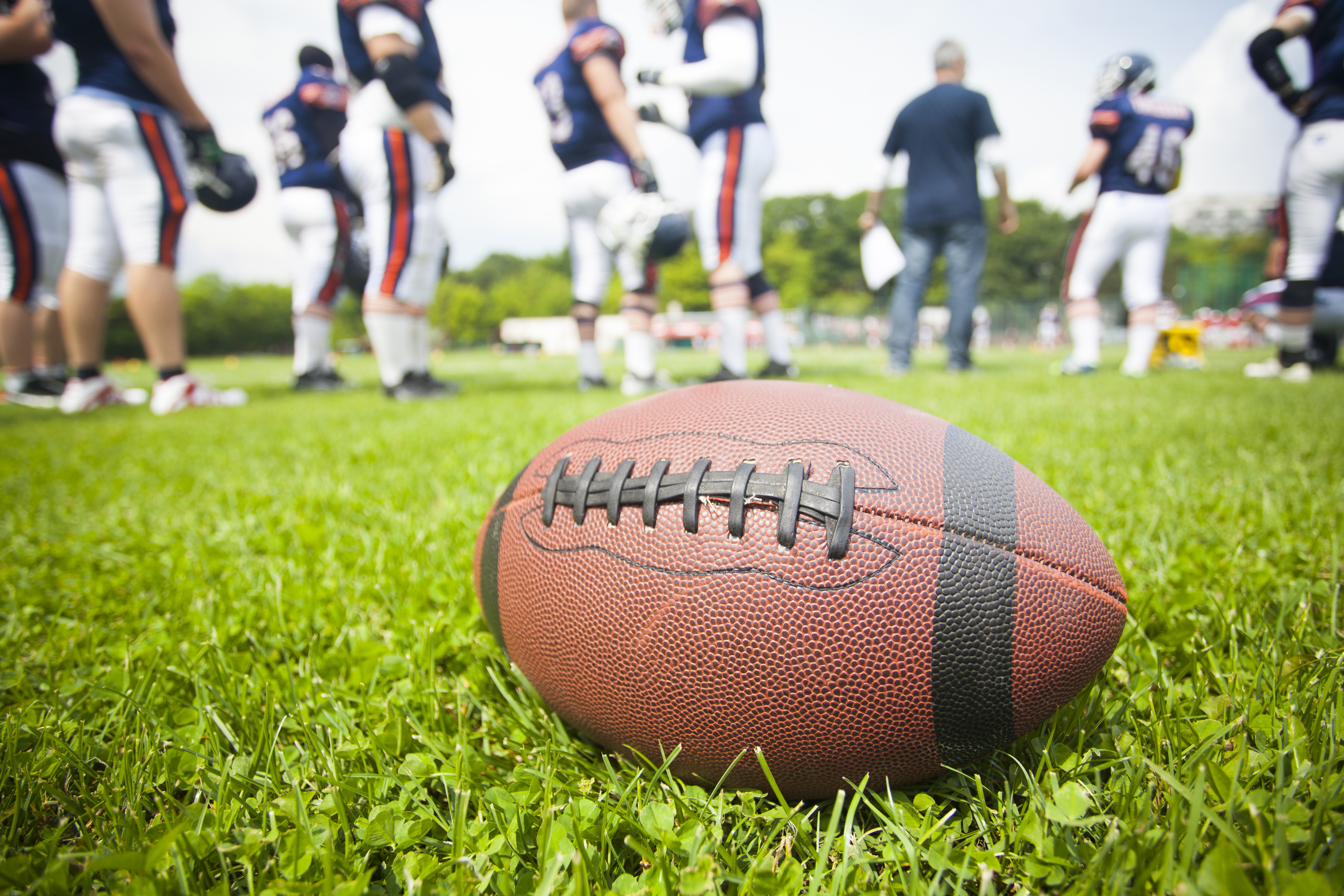 Football on the field before a game